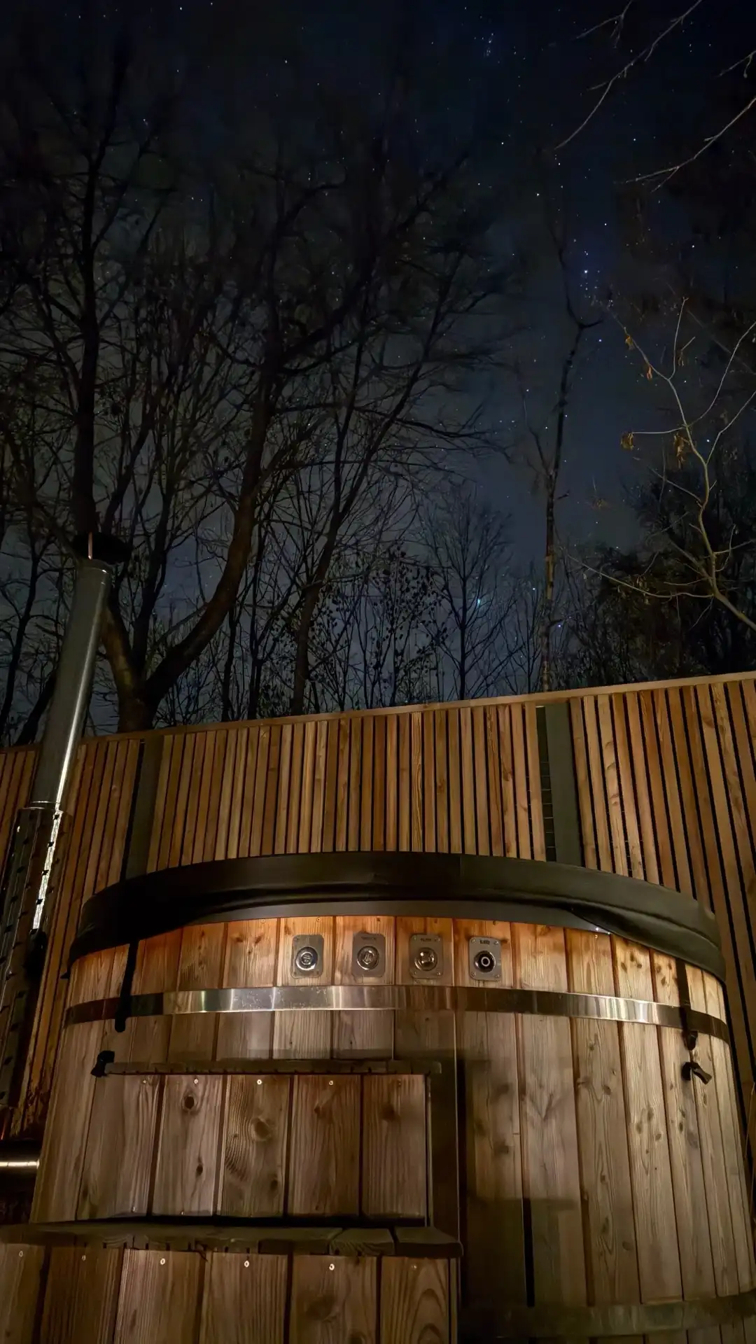 Wellness area at Johanka glamping — hot tub, deck and outdoor shower with mountain view